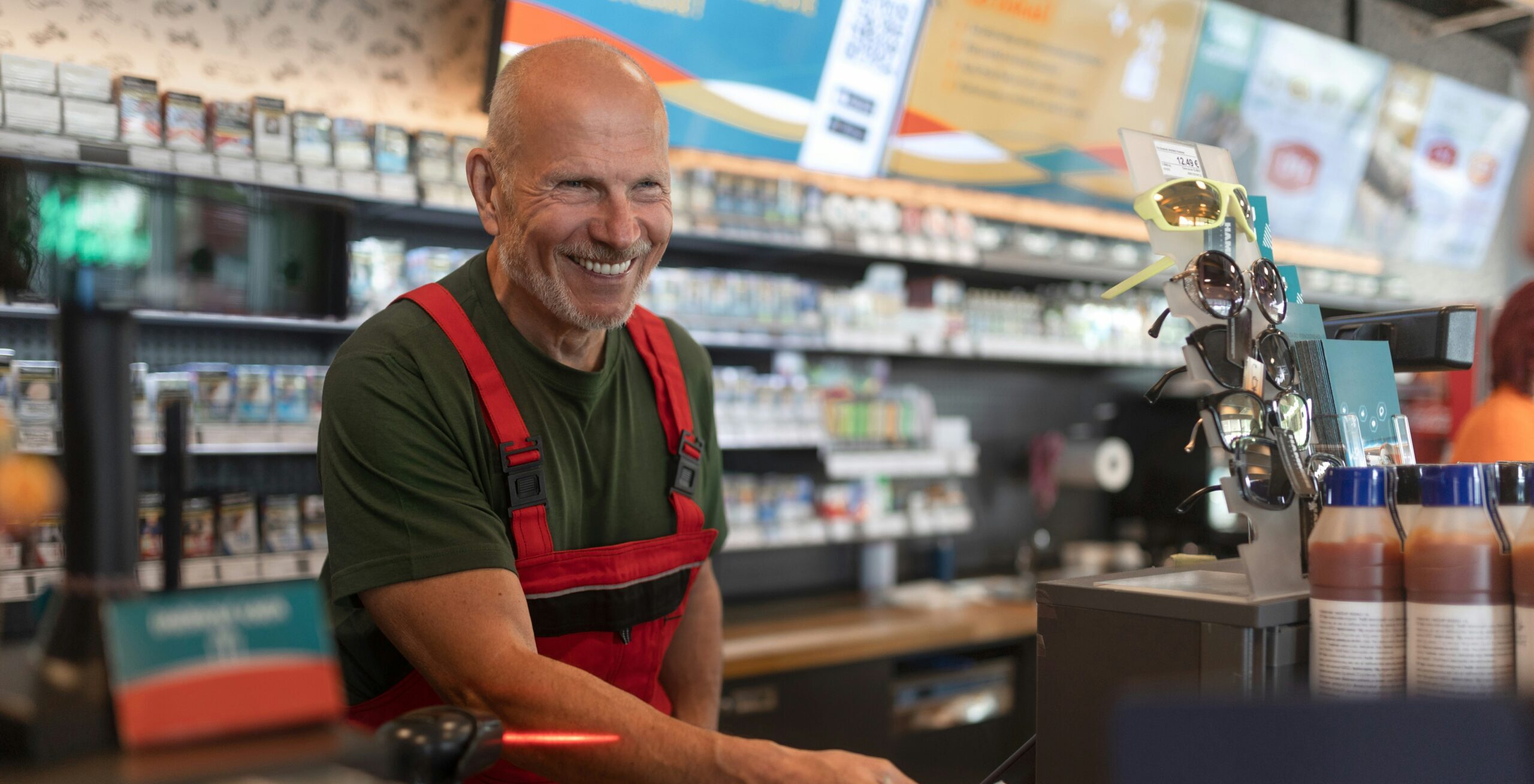 Retail manager at a shop with customer